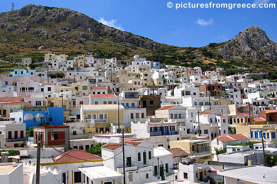 Menetes with its colourful houses is the village closest to Pigadia in Karpathos.
